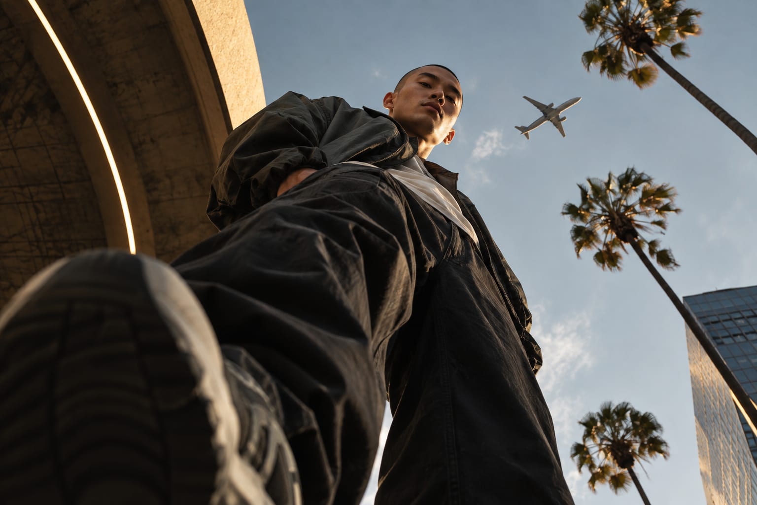 A photograph looking straight up from beneath the subject against the sky.